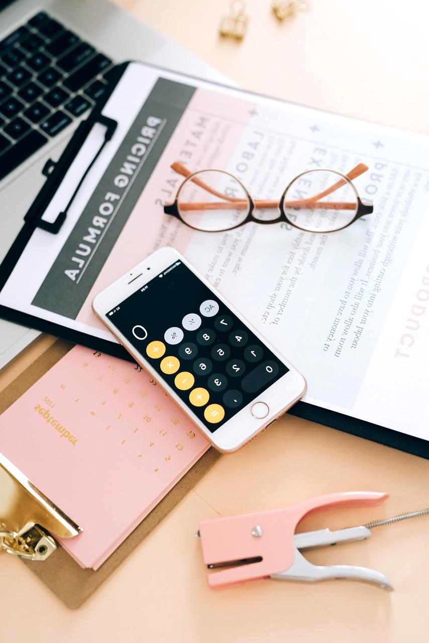 Smart workspace with multiple devices showing digital dashboards
